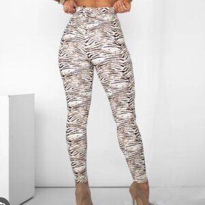 Zebra leggings from Byegreis. Size large.